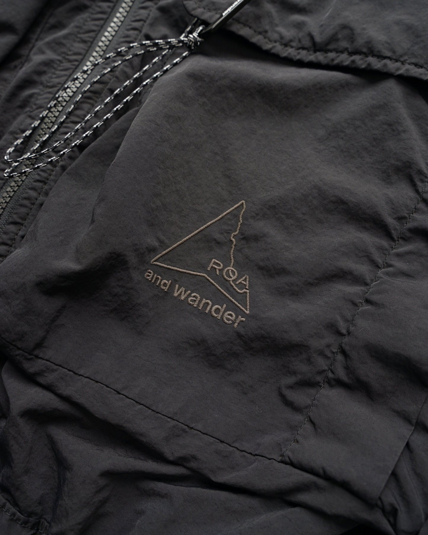 and wander ROA x and wander garment dye nylon hooded jacket