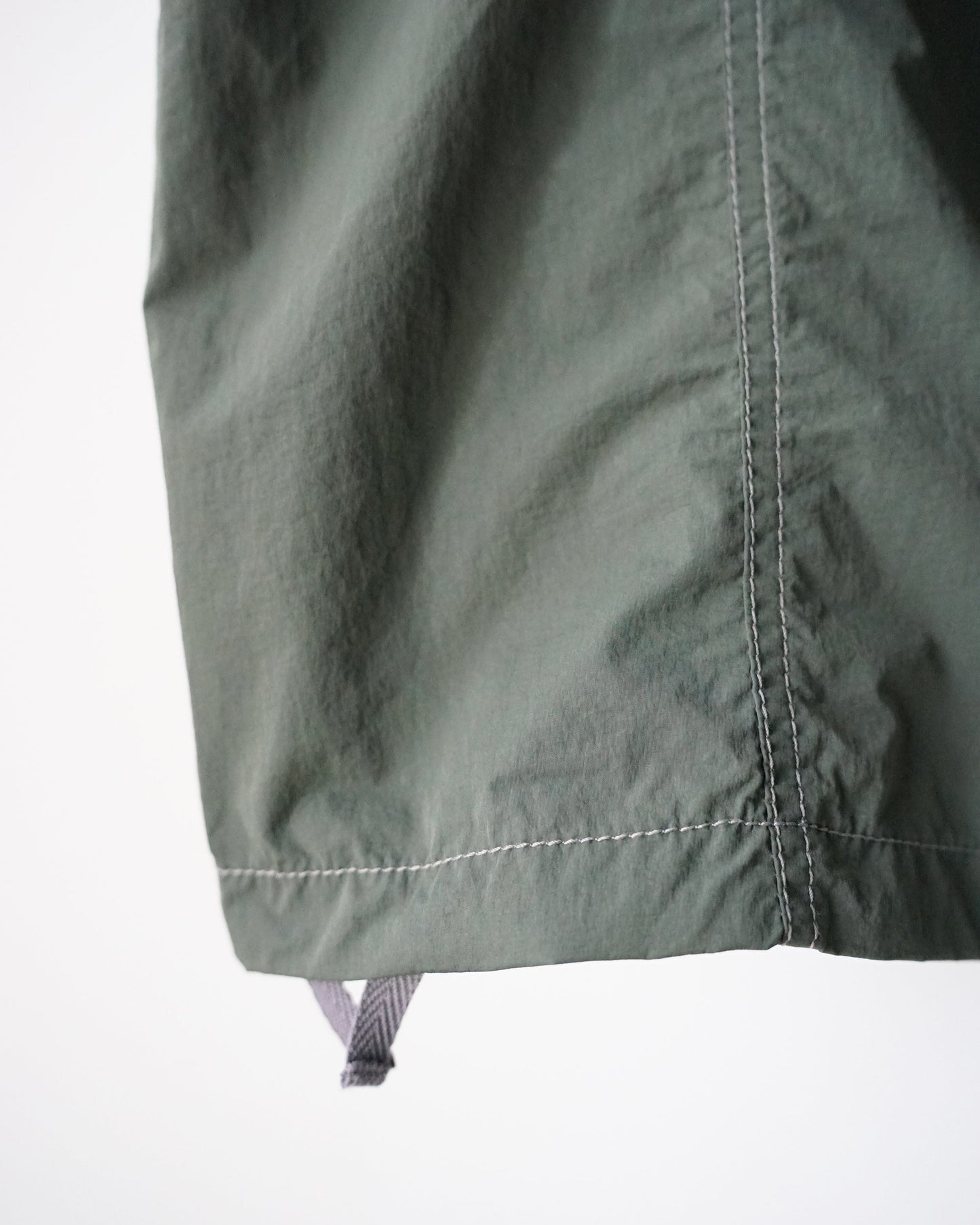 and wander crinkled nylon pants