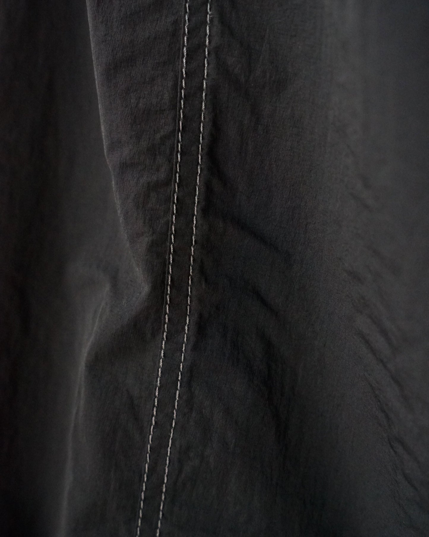 and wander crinkled nylon pants