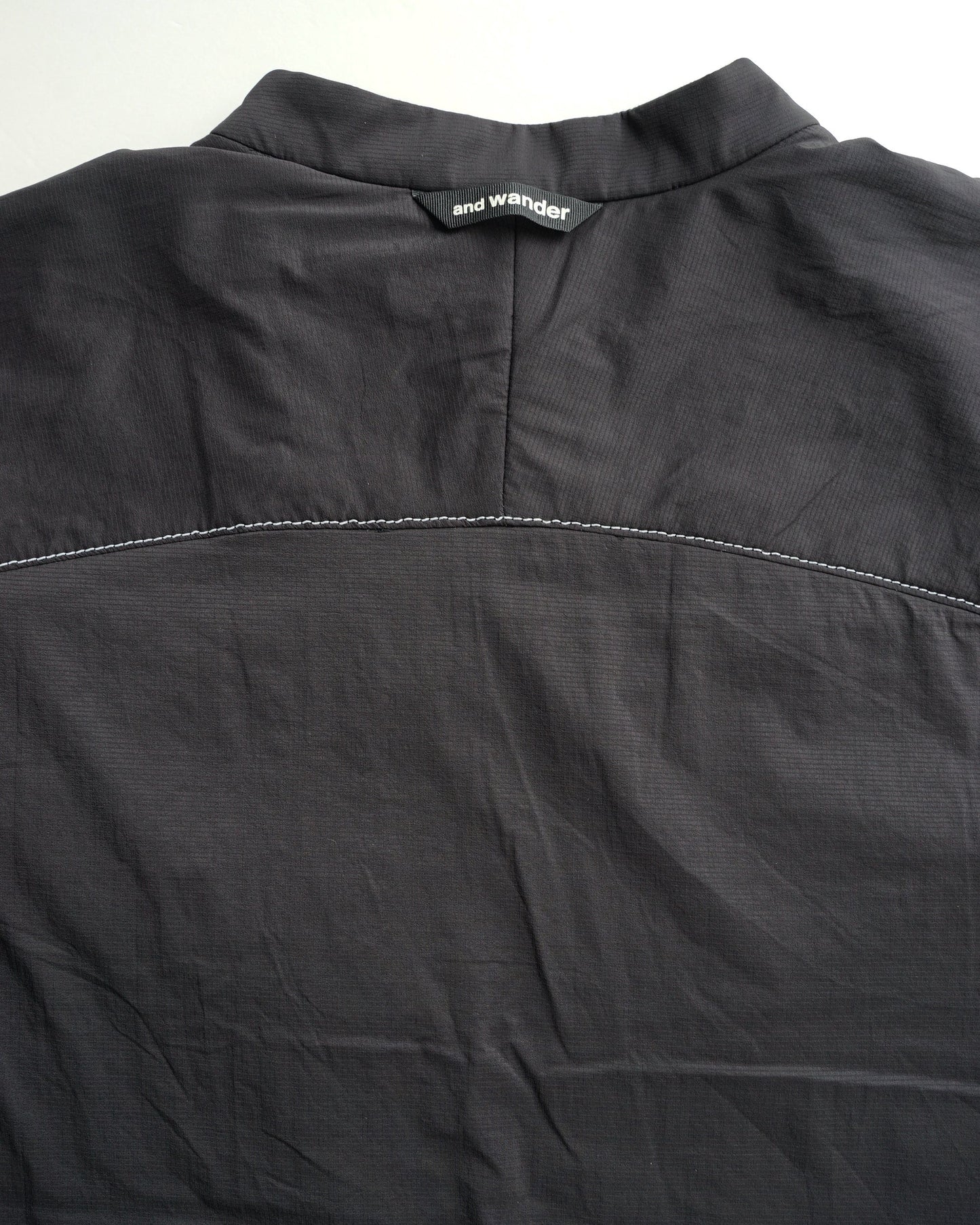 and wander alpha AIR collarless jacket