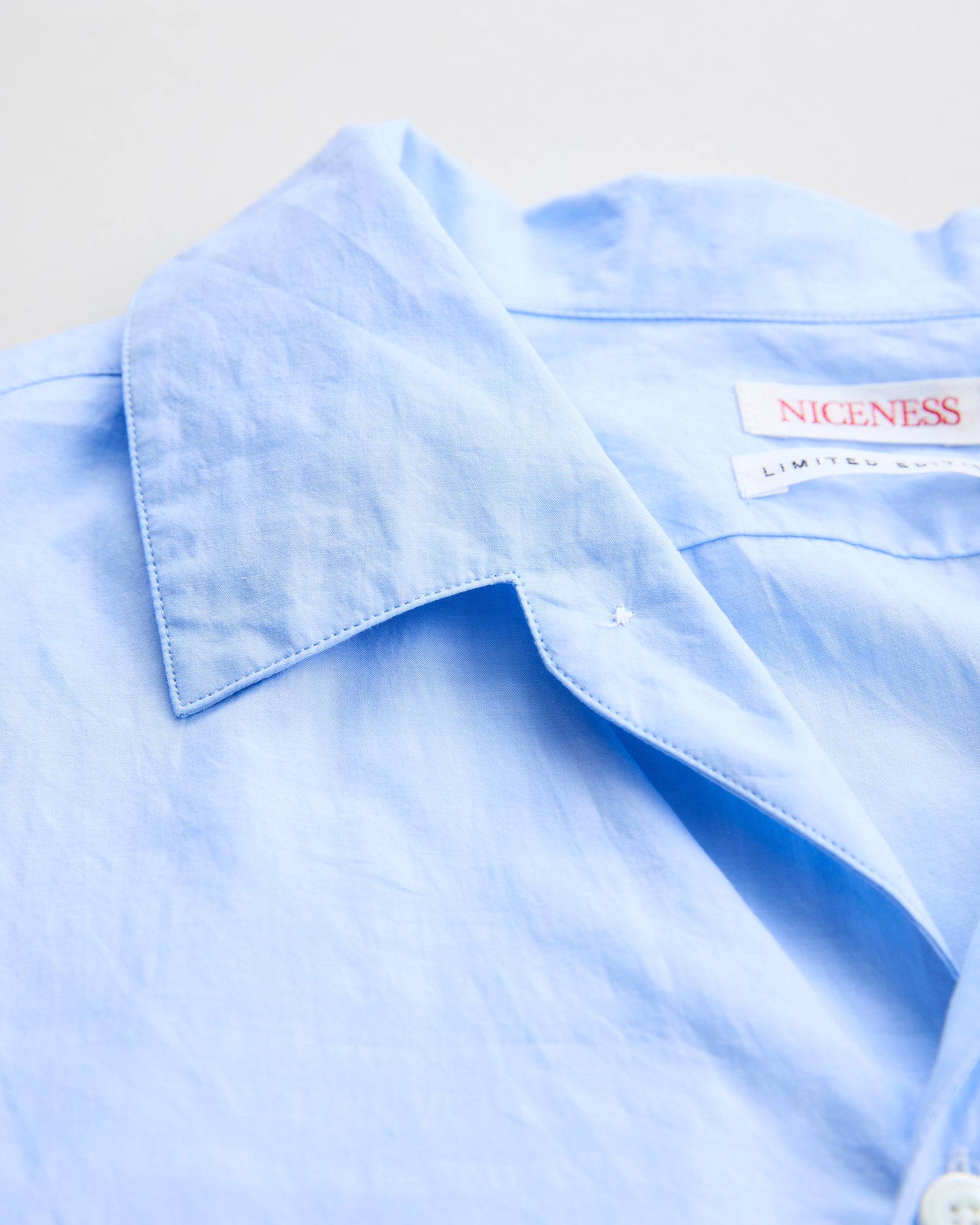 ナイスネス  シャツ　襟部分　ブルー