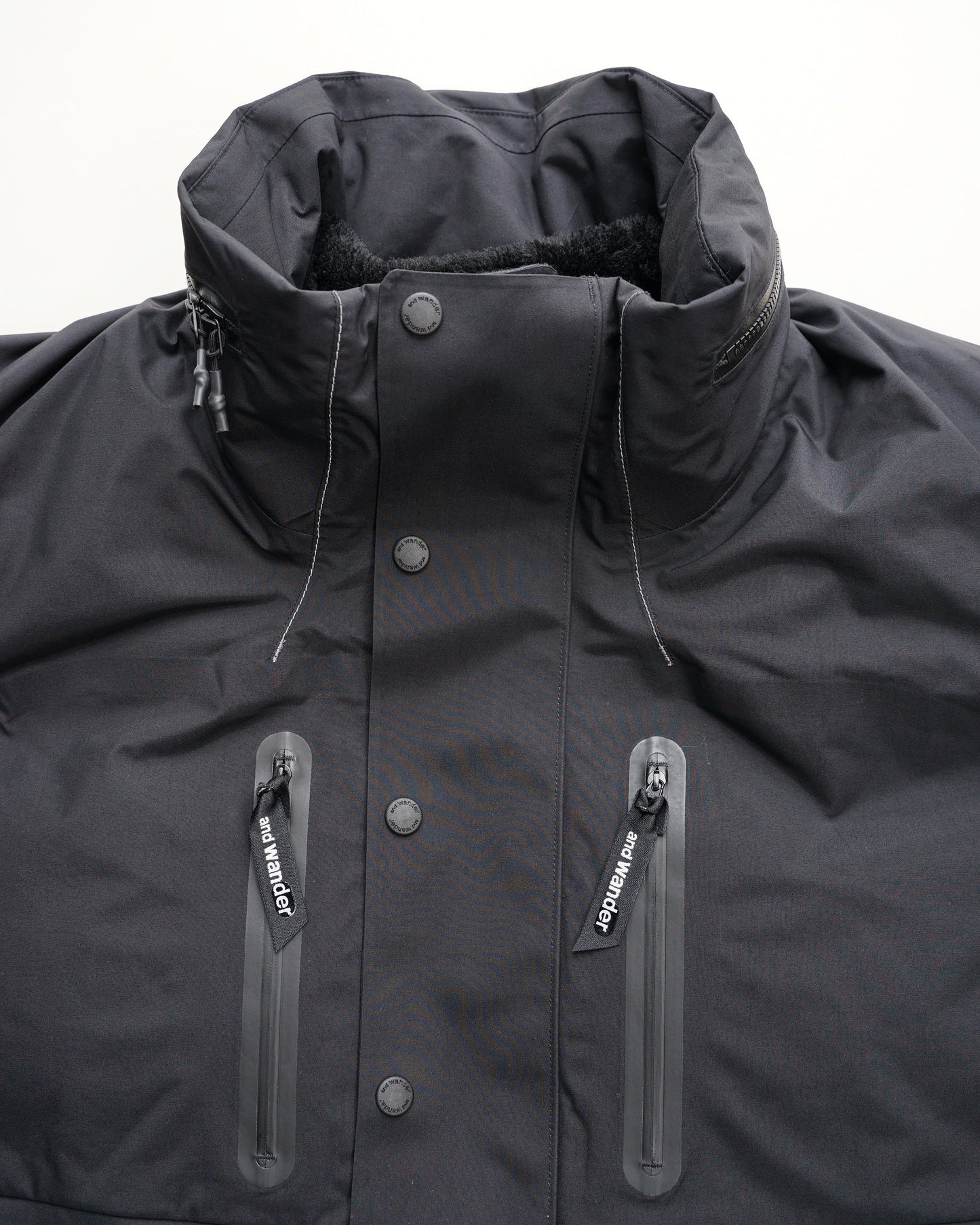 and wander　rain proof down jacket