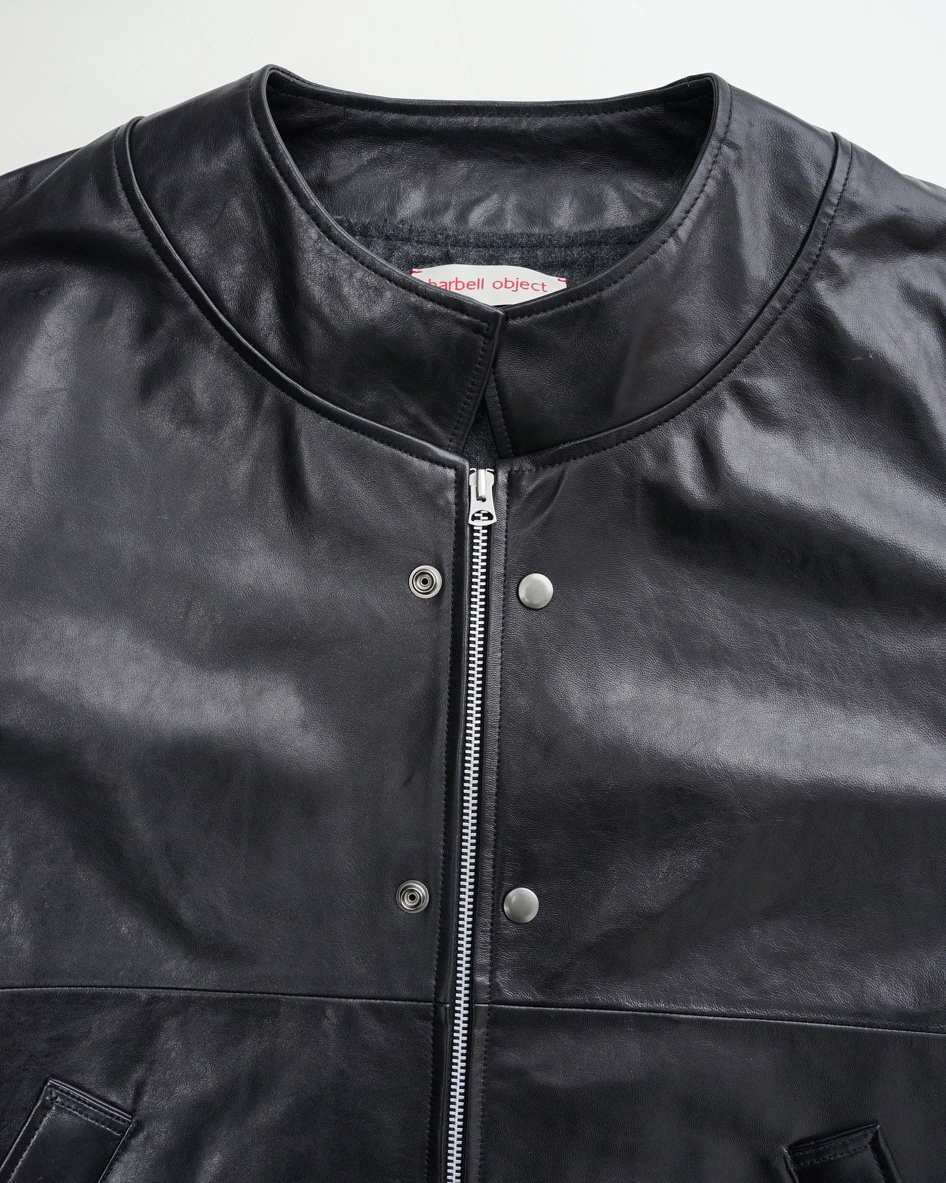 レザージャケット ディテール スナップボタン